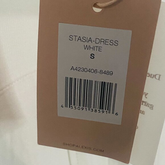 Stasia Alexis Design Sleeveless White Dress for Glamorous Occasions - Picture 13 of 17